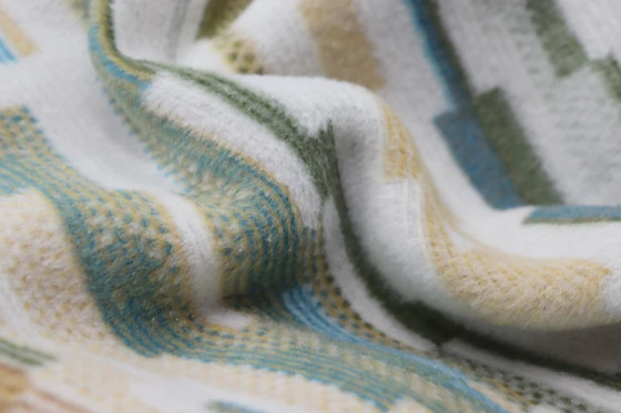 Wohndecke Biederlack Mission Teal – Weich & Zierstich-Akzent